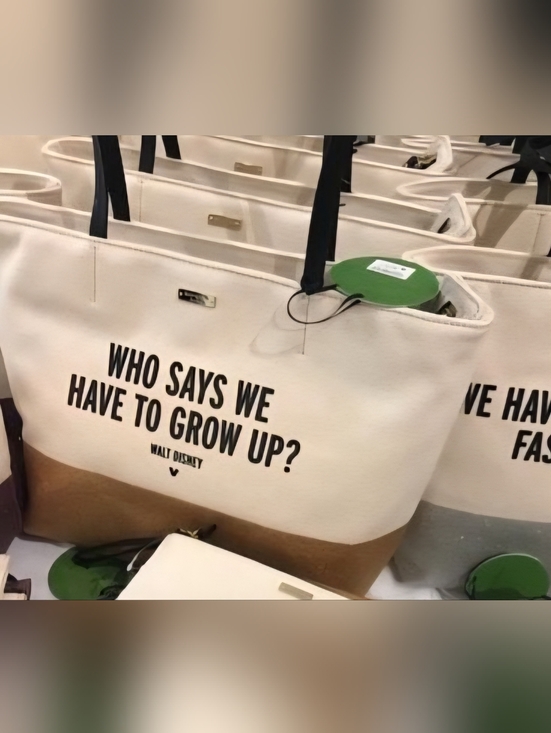 kate spade Handbags - kate spade Cream and Brown Tote with Black Text